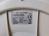 a close up of a toilet seat with a label on it