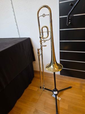 a trumpet that is on a stand in a room