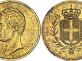 a gold sovereign coin with a crown on top of it