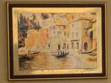 a painting on the wall of a building with a boat in the water