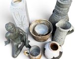many different types of vases on a white surface