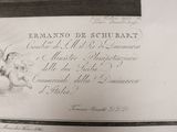 a black and white photo of a document with a picture of two angels on it