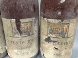 three bottles of beer sitting on top of a table next to each other