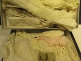 a box full of clothes that is sitting on a table