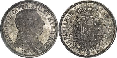 a close up of a silver coin with a crown on it