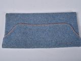 blue denim pouch with orange stitching on top of it