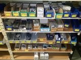 many different types of electronics on the shelves in the store