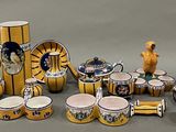 many different types of vases and bowls on the table