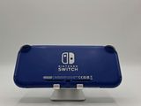 nintendo switch lite with blue case and silver stand