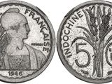a close up of a coin with a tree on it