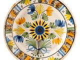 an image of a decorative plate with flowers on it