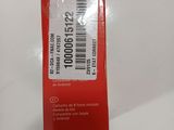 a red box with a barcode on it sitting on a table