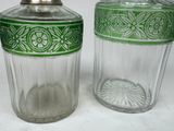 pair of green and white glass salt and pepper shakers