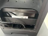 a black oven with a metal door on a table