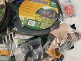 a lot of gardening supplies on the table