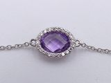 an amethorate and diamond bracelet on a chain