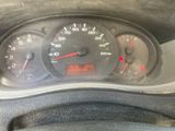 a close up of a car dashboard with a speedometer