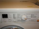 an image of a washer and dryer in a laundry room