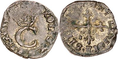 a silver coin with an image of a man on it