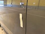 a sticker on the door of a van that is parked in a garage