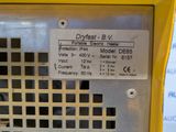 a close up of a yellow machine with a sign on it