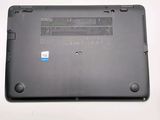 a black laptop with a blue sticker on the back of it