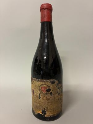 a close up of a bottle of wine on a table