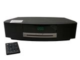a picture of a digital clock radio with a remote