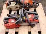 several chainsaws are sitting on a pallet on a wooden pallet