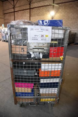 a metal cart with many boxes on it in a warehouse