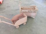 a wooden baby carriage with a basket on the back of it