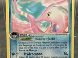 a close up of a pokemon card in a display case