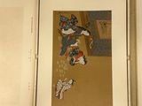 an open book with a picture of a woman and a cat on it