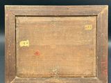 an old wooden box with a small piece of wood on it