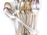 a lot of spoons and spoon spoons on a white surface