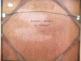 a piece of luggage sitting in a box with writing on it