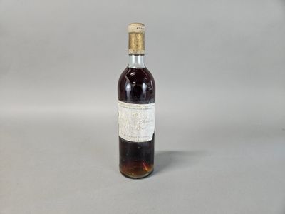 a bottle of wine that is sitting on a table