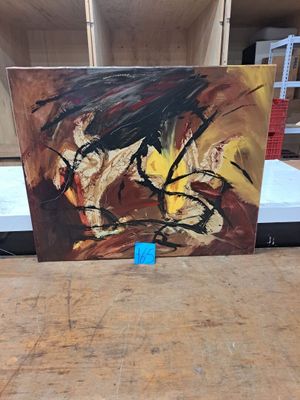 a picture of a painting on a table in a room