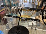 a display of jewelry in a glass case in a store