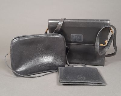 a black purse and a wallet on a table