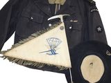 a military uniform with a hat and a flag on it