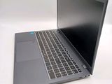 a laptop that is sitting on a white table