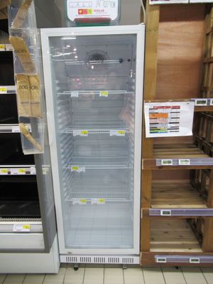 a refrigerator that is sitting in the middle of a store