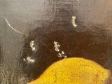 painting of a lemon and a bee on a black background