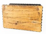 a piece of wood that is sitting on top of a table