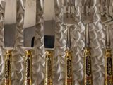 five knives and a knife holder in a box