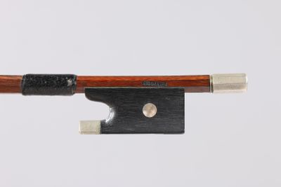 a close up of a violin bow on a white background