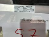 a sign on the front of a dishwasher with a price tag on it