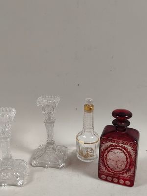 a lot of glass items that are sitting on a table