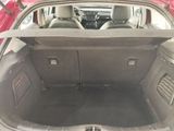 a trunk of a car with the back seats folded down